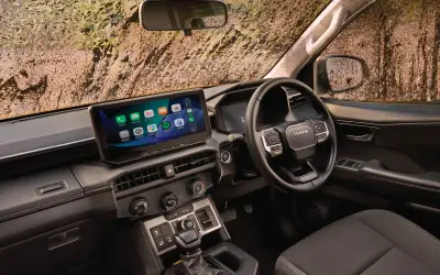 2026 Toyota Hilux dashboard with 12.3-inch touchscreen and wireless Apple CarPlay