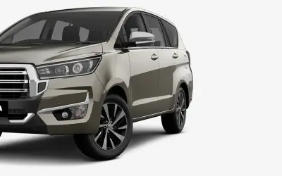 Toyota Innova Crysta front three-quarter view in Avant Garde Bronze