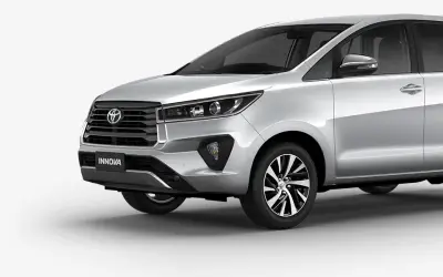Toyota Innova Crysta front three-quarter view in Silver Metallic