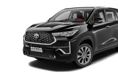 Toyota Innova Hycross front three-quarter view in Attitude Black