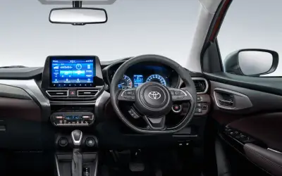Toyota Urban Cruiser Taisor dashboard with touchscreen and steering wheel