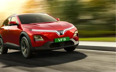 VinFast VF 6 front three-quarter view in red