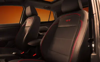 Volkswagen Taigun GT interior - front seats with GT embossing and red stitching