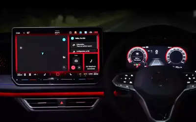 Volkswagen Tiguan R-Line interior - dashboard at night with 15-inch touchscreen, digital cockpit and red ambient lighting