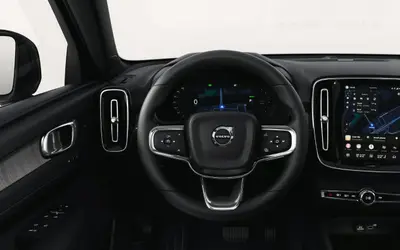 Volvo EC40 dashboard from the driver's seat, with the driver display and centre touchscreen