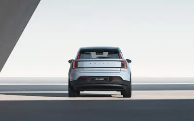 Volvo EX30 rear view showing the split tail lamps and EX30 badge